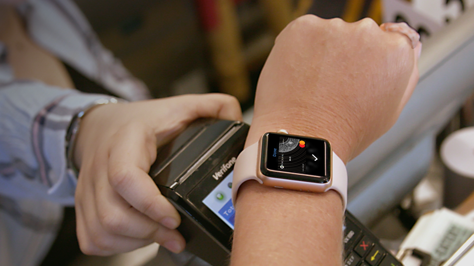 Woman paying with apple watch