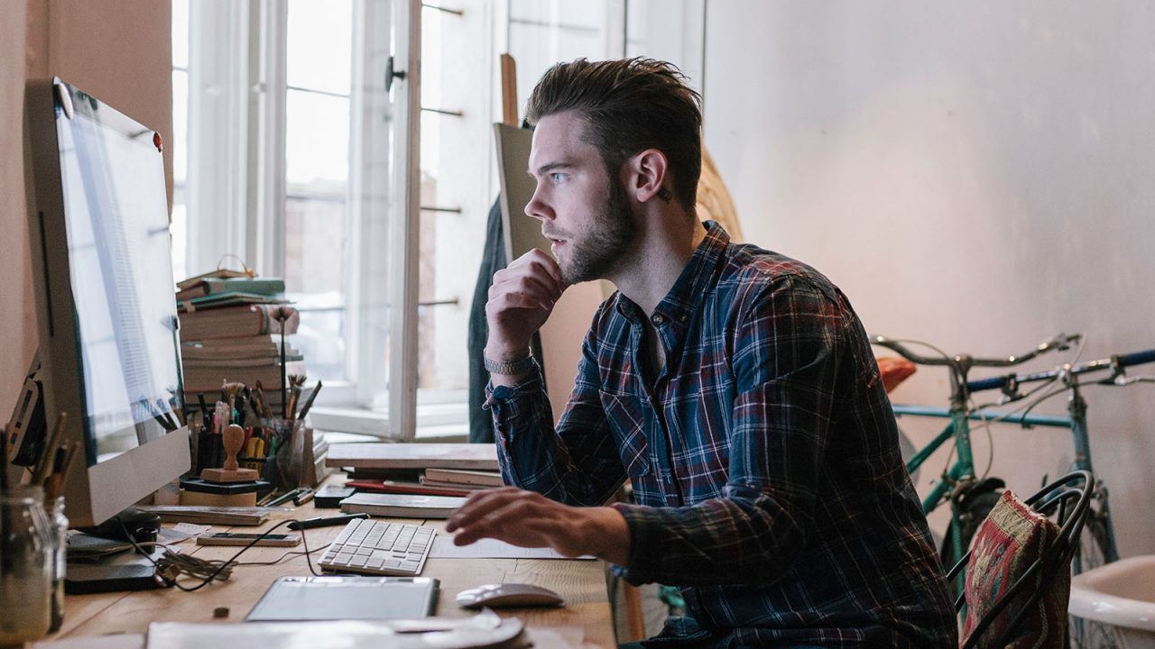 Man working from home office in casual clothes